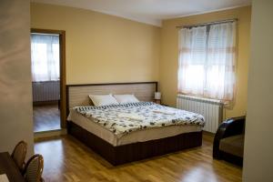 Postel nebo postele na pokoji v ubytování Hotel Bella Nella