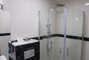 Koupelna v ubytování Hotel Bella Nella