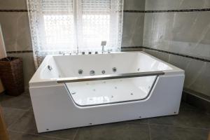 Koupelna v ubytování Hotel Bella Nella