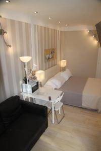 Postel nebo postele na pokoji v ubytování B&B Pescara Centro Luxury Suite