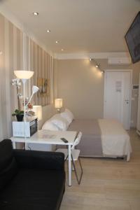 Postel nebo postele na pokoji v ubytování B&B Pescara Centro Luxury Suite
