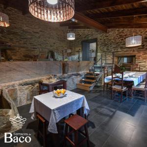 Reštaurácia alebo iné gastronomické zariadenie v ubytovaní Terraços de Baco