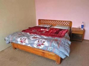Katil atau katil-katil dalam bilik di Green Park Hotel Shogran