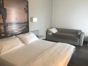 Postel nebo postele na pokoji v ubytování Hotel Principe Palace