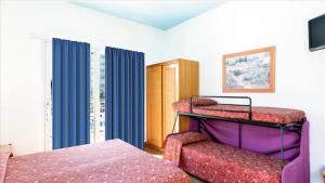 Postel nebo postele na pokoji v ubytování Hotel Principe Palace
