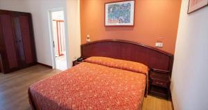 Postel nebo postele na pokoji v ubytování Hotel Principe Palace