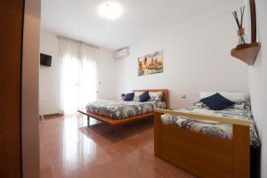 A bed or beds in a room at Suite art Pigneto