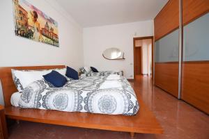 מיטה או מיטות בחדר ב-Suite art Pigneto