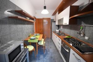 Una cocina o cocineta en Suite art Pigneto