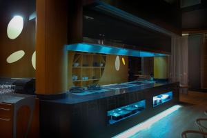 Kuchyň nebo kuchyňský kout v ubytování Protur Roquetas Hotel & Spa