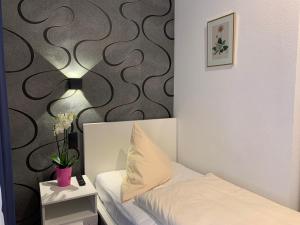 Voodi või voodid majutusasutuse Hotel B54 Heidelberg City Center toas