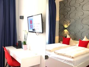 Voodi või voodid majutusasutuse Hotel B54 Heidelberg City Center toas