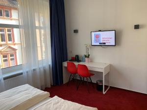 Voodi või voodid majutusasutuse Hotel B54 Heidelberg City Center toas