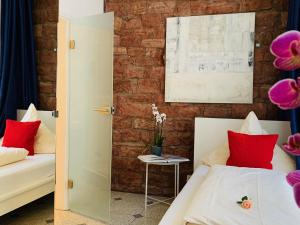 Voodi või voodid majutusasutuse Hotel B54 Heidelberg City Center toas