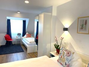 Voodi või voodid majutusasutuse Hotel B54 Heidelberg City Center toas