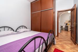 Casa das Camélias tesisinde bir odada yatak veya yataklar