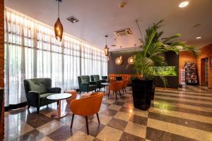 Χώρος καθιστικού στο Expo Hotel