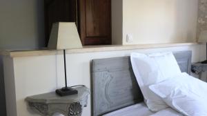 Letto o letti in una camera di Chambre d'hotes la Quercynoise