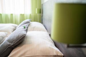 Voodi või voodid majutusasutuse eee Hotel Liezen toas