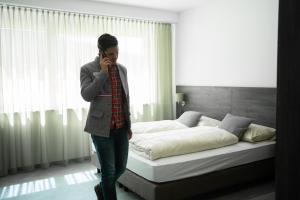 Voodi või voodid majutusasutuse eee Hotel Liezen toas