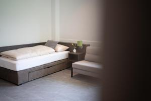Voodi või voodid majutusasutuse eee Hotel Liezen toas