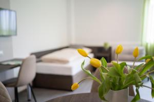 Voodi või voodid majutusasutuse eee Hotel Liezen toas