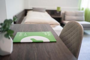 Voodi või voodid majutusasutuse eee Hotel Liezen toas