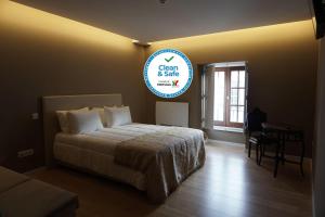 Postel nebo postele na pokoji v ubytování Feira Hostel & Suites