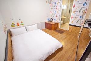 Letto o letti in una camera di Dons Young Homestay
