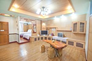TV a/nebo společenská místnost v ubytování Dons Young Homestay