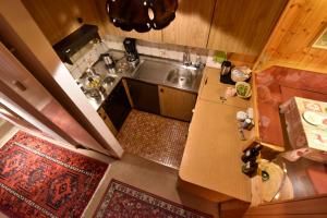 Η κουζίνα ή μικρή κουζίνα στο Cosy 3.5 pièce à Täsch