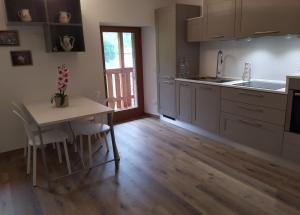 Kuchyň nebo kuchyňský kout v ubytování B&B Da Pieri