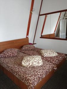 Кровать или кровати в номере Hotel Vivat