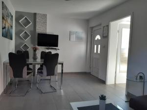 TV a/nebo společenská místnost v ubytování Guest House Sonja