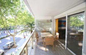 A balcony or terrace at DIFFERENTFLATS Samoa