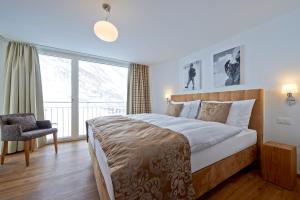 Voodi või voodid majutusasutuse Welschen Apartments Hörnligrat toas