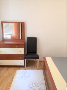 Postel nebo postele na pokoji v ubytování Zlatko Apartments