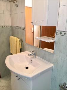 Koupelna v ubytování Zlatko Apartments + 10 fotografií