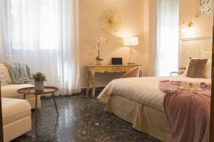 Posteľ alebo postele v izbe v ubytovaní Accanto Al Centro B&B