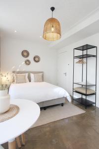 Uma cama ou camas num quarto em Hotel Paradis Zandvoort