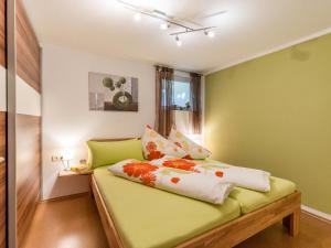 Postel nebo postele na pokoji v ubytování Ferienwohnung Petra + 11 fotografií