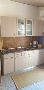 Kuchyňa alebo kuchynka v ubytovaní Apartment Tonči