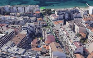 an aerial view of a city with buildings at Appartements French Riviera Confidential Centre Ville Juan les Pins proche des plages in Juan-les-Pins