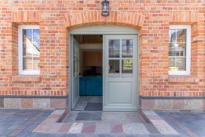 Fasada lub wejście do obiektu DOMKI APARTAMENTOWE CHMIELÓWKA