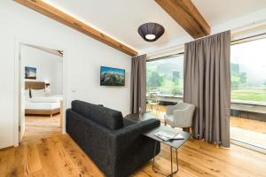 TV a/nebo společenská místnost v ubytování Apartmenthotel Sonnenhof