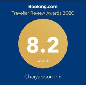 a yellow circle with the number eight and the words travelling review awards at Chaiyapoon Inn in Pattaya Central