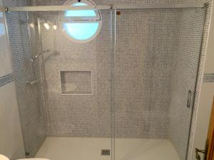 a shower with a glass door in a bathroom at AV Andalucía - Tarifa - Parking incluido in Tarifa +7 photos
