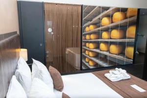 Postel nebo postele na pokoji v ubytování City Hotel Gouda, WorldHotels Crafted Collection