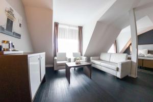 Posezení v ubytování City Hotel Gouda, WorldHotels Crafted Collection