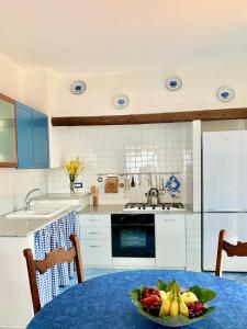 Kuchyň nebo kuchyňský kout v ubytování Casa Siciliano